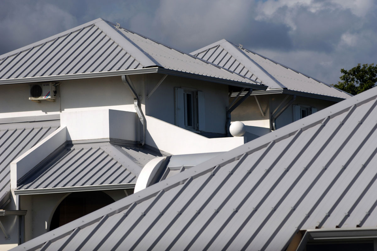 How Much Does Metal Roof Painting Cost? (2024)